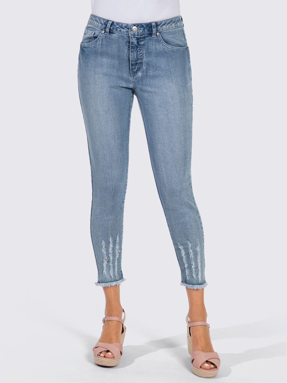 Jean 7/8 effet « destroy » tendance - Helline - Modalova
