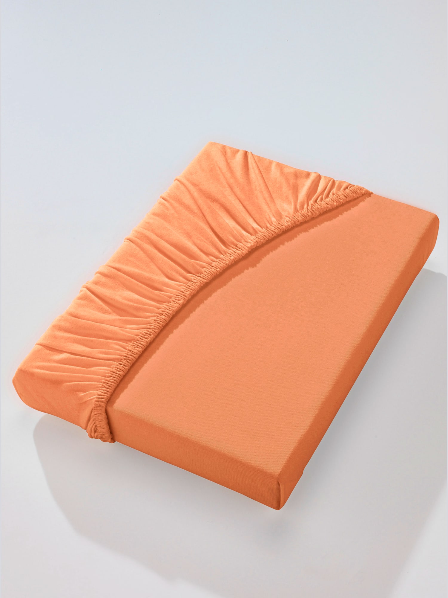 Drap-housse maille fine peignée, couleur orange, taille 1 pièce 120x200 cm, largeur excédentaire, marque Biberna - helline