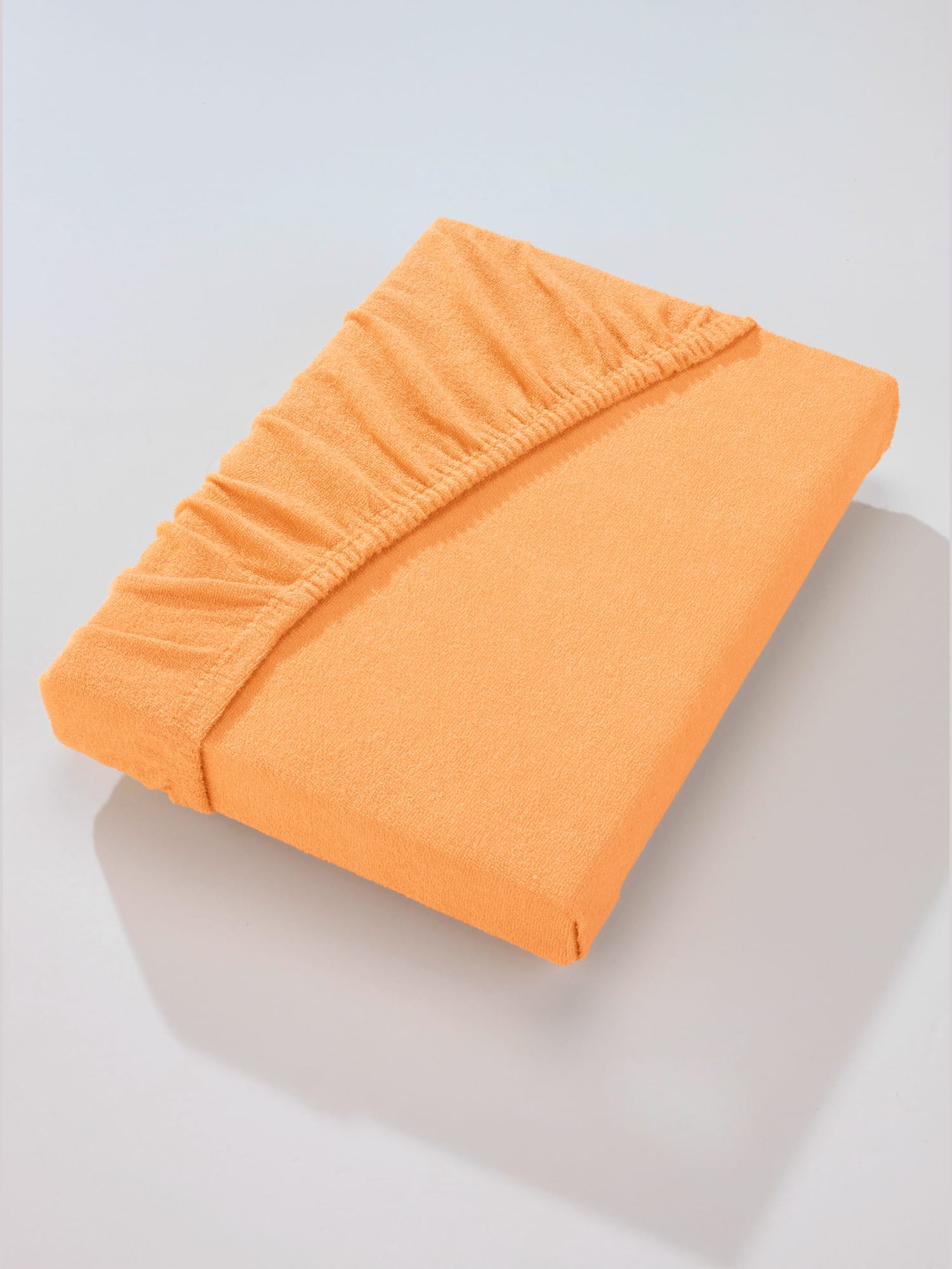 Drap-housse résistant aux nœuds et élastique, Éponge, orange clair uni, taille 1 pièce 90x190 - 100x200 cm, Biberna - helline