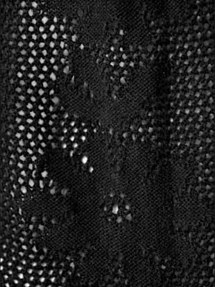 Veste en tricot ajouré motif tricoté avec partie ajourée devant
