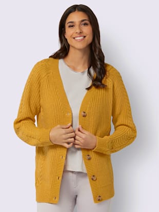 Veste en tricot manches raglan avec joli motif torsadé