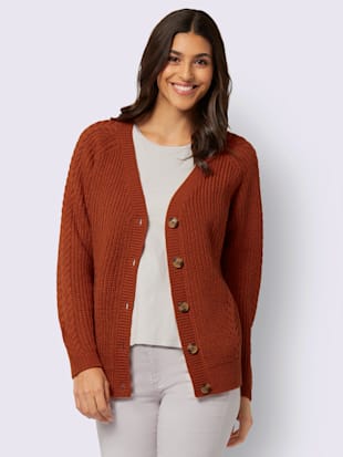 Veste en tricot manches raglan avec joli motif torsadé