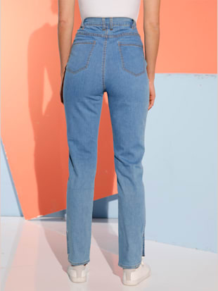 Jean finition arrondie au bas des jambes