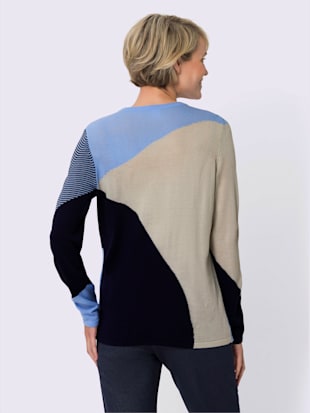 Pull motif tricoté asymétrique