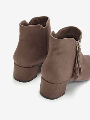 Bottines détails houppe tendance