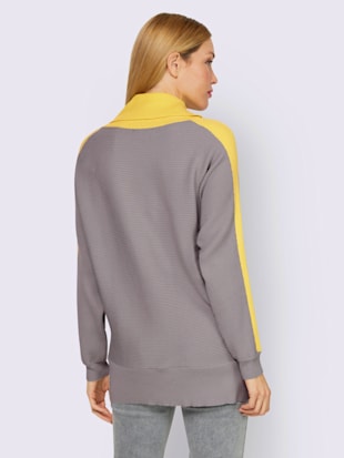 Pull col roulé flatteur