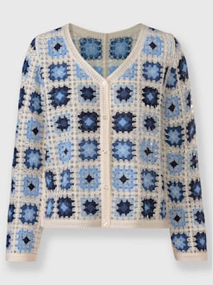 Veste en tricot aspect crochet