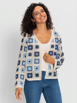 Veste en tricot aspect crochet