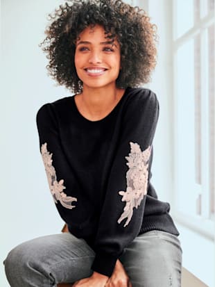 Pull dentelle sur les manches