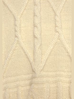 Veste longue en tricot à motif torsadé