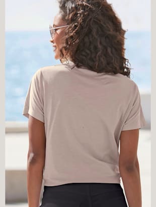 T-shirt à manches courtes encolure ronde dégagée avec ourlet roulotté