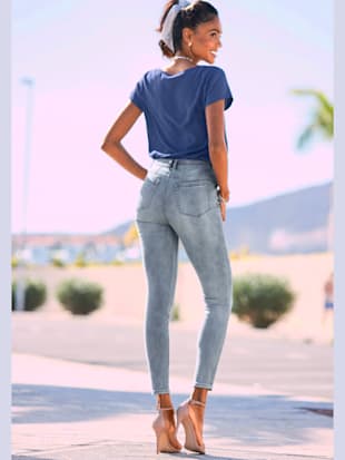 Jean skinny fit patte de boutonnage visible devant
