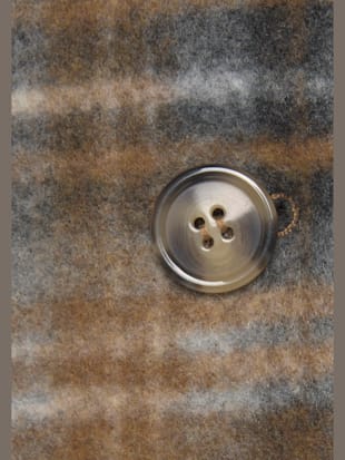 Manteau à carreaux avec grand col à revers