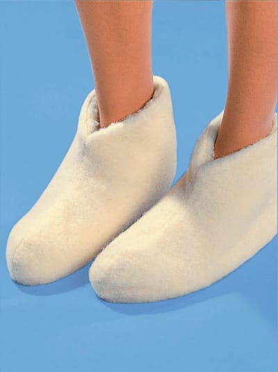 Chaussons de lit doux et chaud