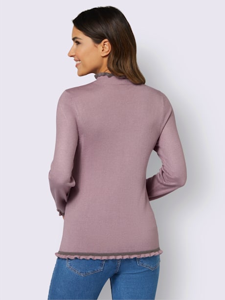 Pull à col montant jolis falbalas