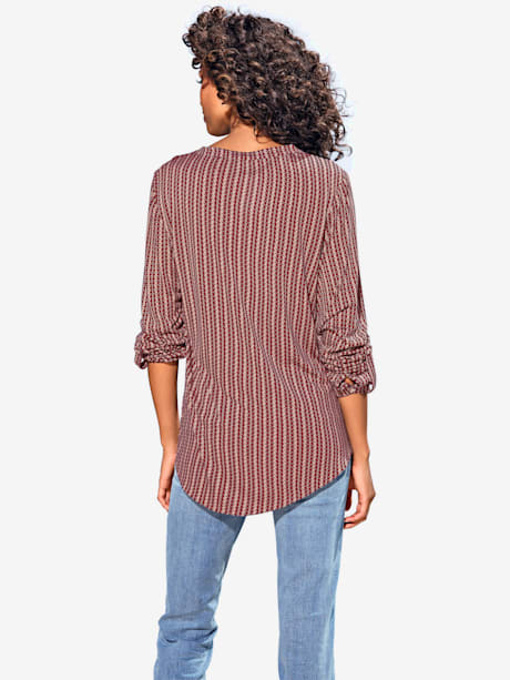Chemisier léger look tendance avec ourlet arrondi