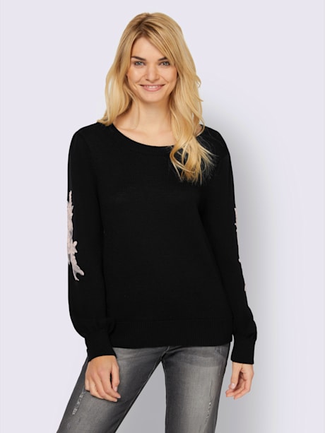 Pull dentelle sur les manches