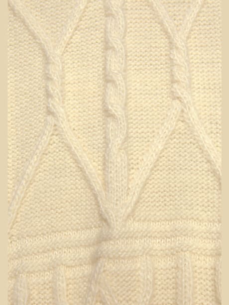 Veste longue en tricot à motif torsadé