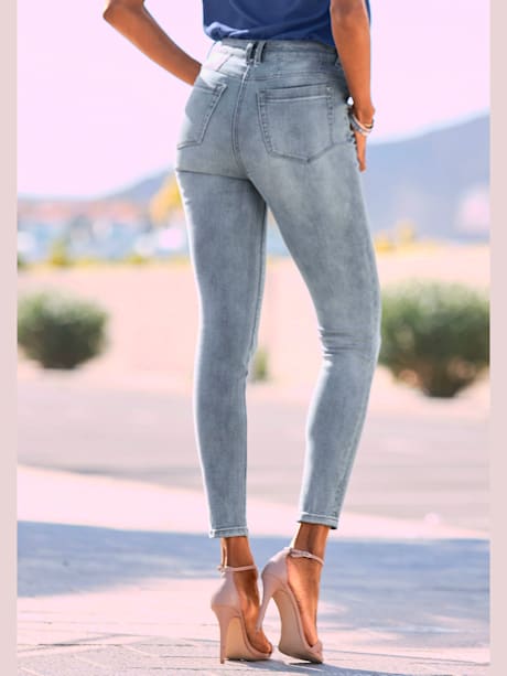 Jean skinny fit patte de boutonnage visible devant