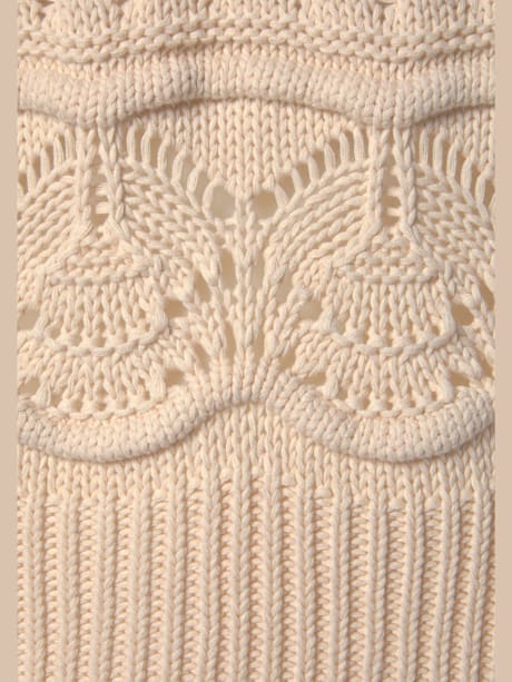 Pull col roulé en tricot ajouré