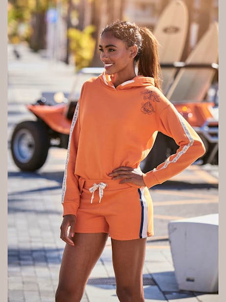 Short en matière sweat short sport ample