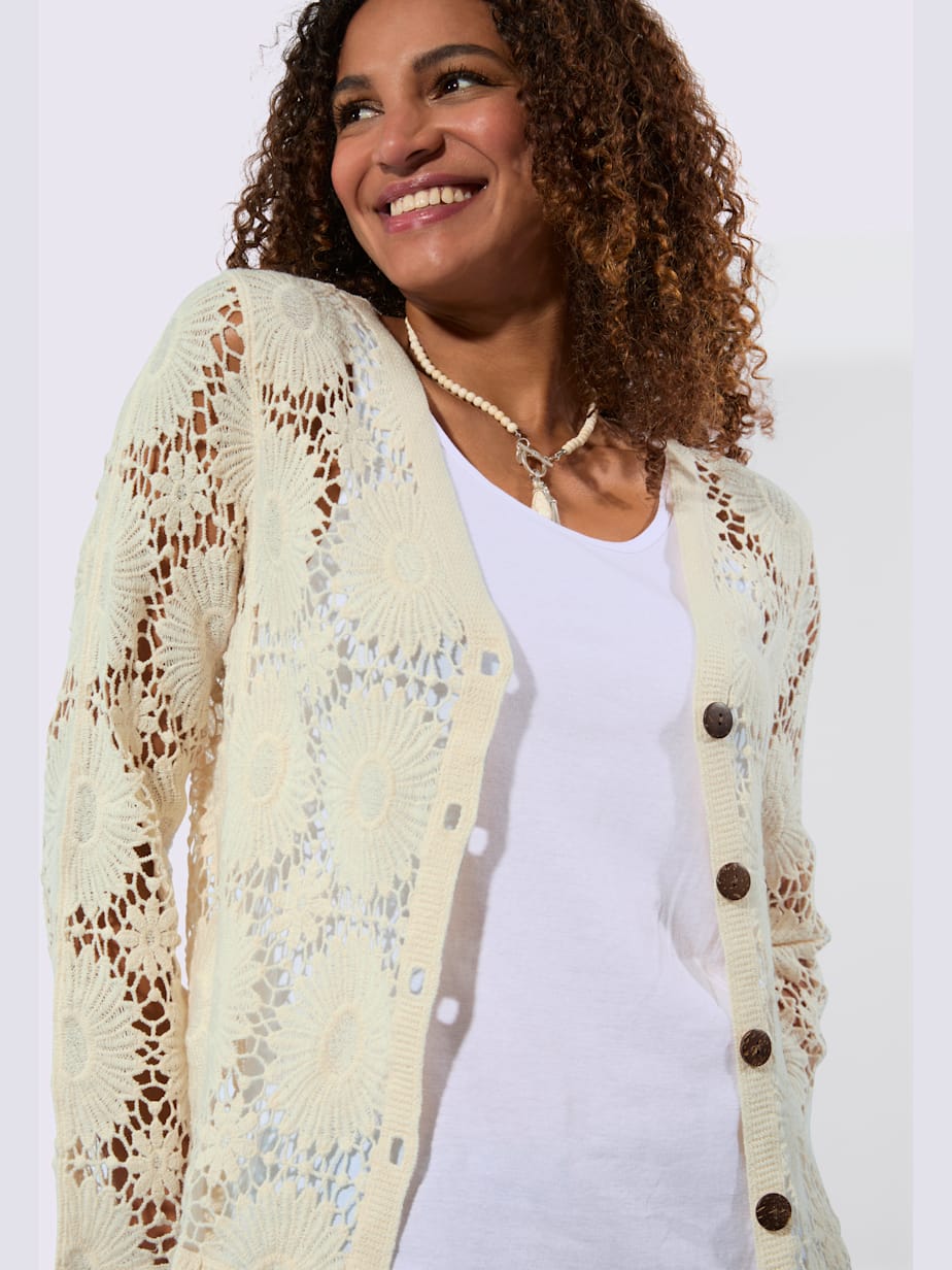 Veste tricot col V manches longues motif crochet floral